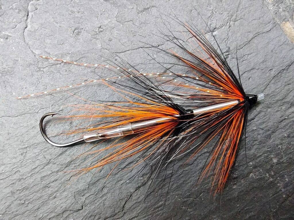 Black & Orange Intruder Tube Fly